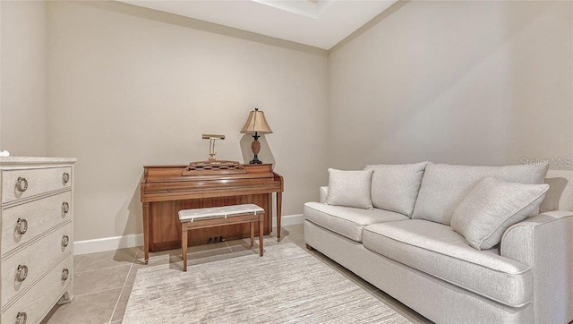 sitting room with light tile patterned floors