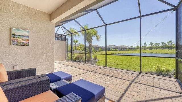 sunroom with a water view