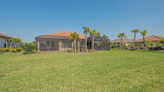 view of yard featuring a lanai