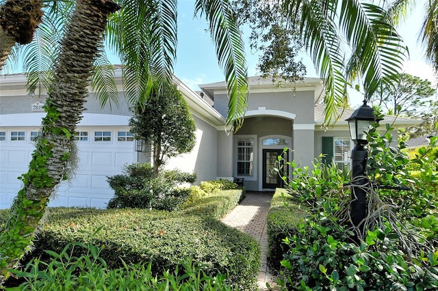 view of front of house featuring french doors and a garage