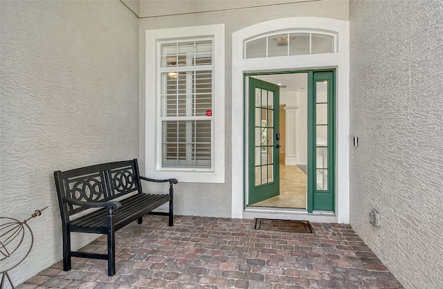 entrance to property featuring french doors