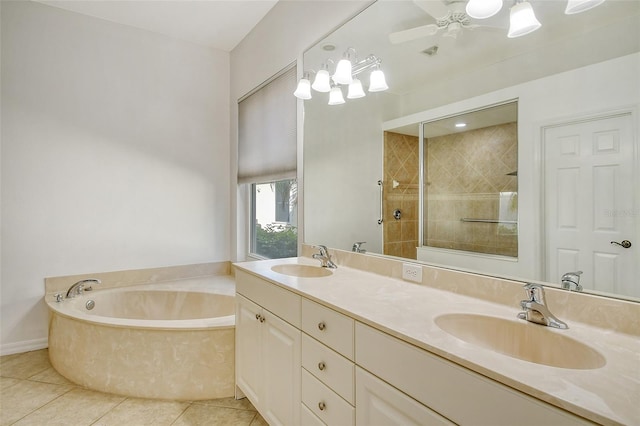 bathroom featuring tile patterned flooring, vanity, separate shower and tub, and ceiling fan