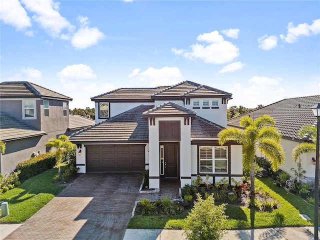 view of front of home with a garage