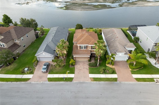 birds eye view of property featuring a water view