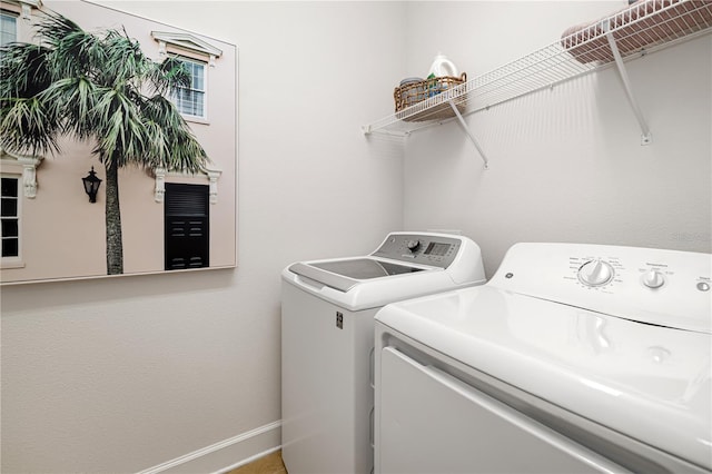 laundry area featuring separate washer and dryer