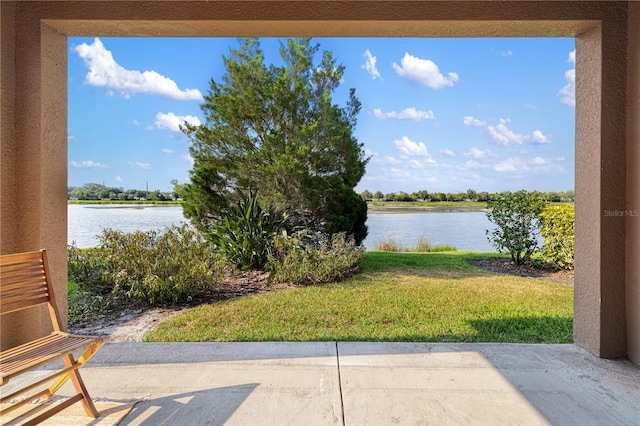 view of patio / terrace with a water view