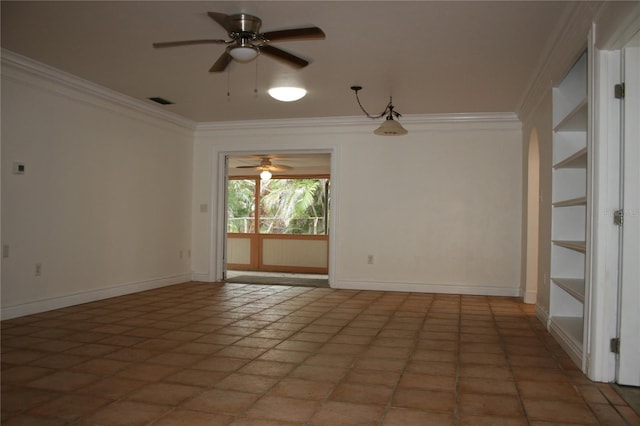 tiled spare room with ceiling fan and ornamental molding