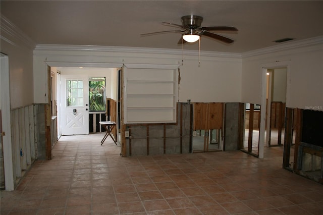 interior space featuring crown molding and ceiling fan