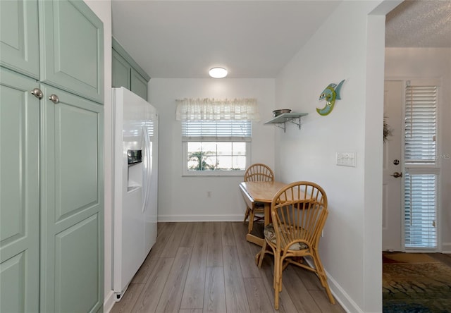 sitting room with light hardwood / wood-style floors