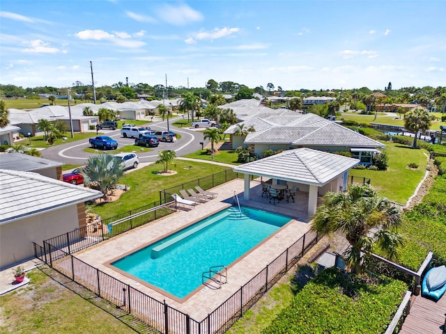 view of pool with a gazebo, a lawn, and a patio area