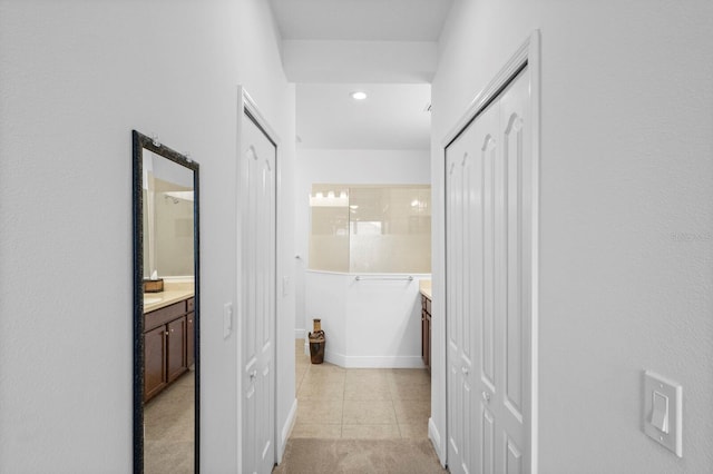 14538 Barefoot Ln, Parrish, FL 34219 - hall with light tile patterned flooring and recessed lighting