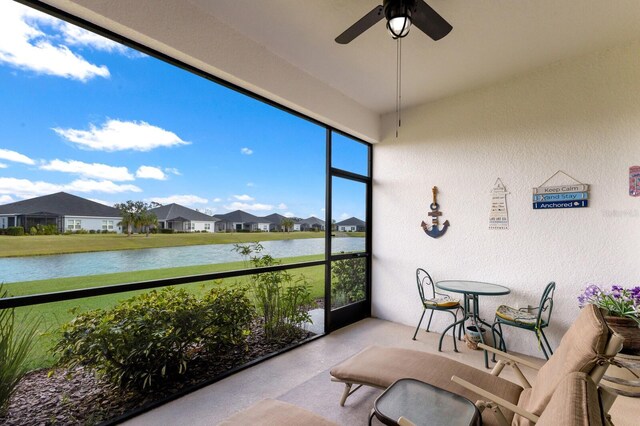 14538 Barefoot Ln, Parrish, FL 34219 - sunroom / solarium featuring a water view and a residential view