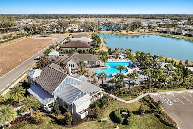 drone / aerial view with a water view