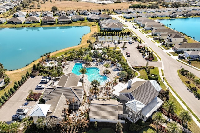 bird's eye view with a water view