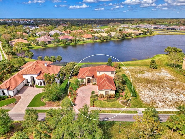 drone / aerial view with a water view