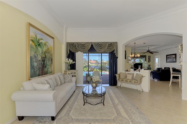 1509 Raphis Royale Blvd, Englewood, FL 34223 - living area featuring arched walkways, a chandelier, light tile patterned floors, healthy amount of natural light, and crown molding