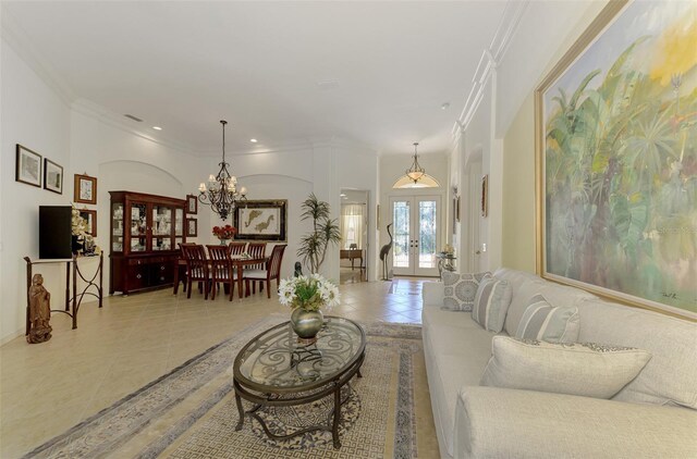 1509 Raphis Royale Blvd, Englewood, FL 34223 - tiled living area featuring french doors, a chandelier, crown molding, and recessed lighting