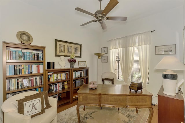 office area with hardwood / wood-style flooring and ceiling fan