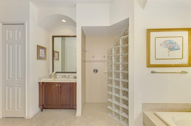 1509 Raphis Royale Blvd, Englewood, FL 34223 - full bathroom featuring walk in shower, tile patterned flooring, vanity, and tiled tub