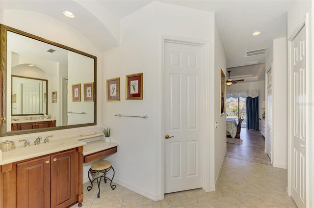1509 Raphis Royale Blvd, Englewood, FL 34223 - bathroom with vanity, ensuite bath, tile patterned flooring, baseboards, and recessed lighting