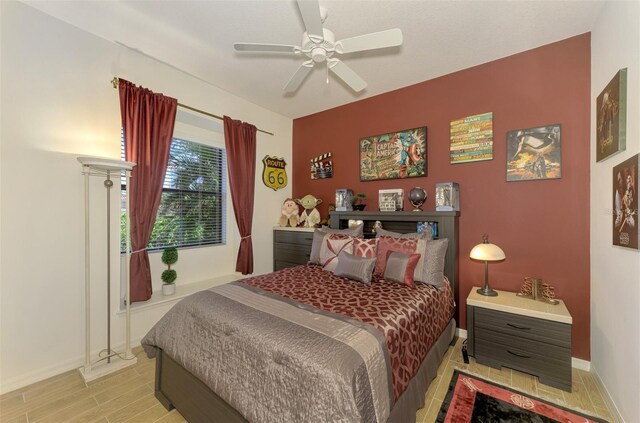 1509 Raphis Royale Blvd, Englewood, FL 34223 - bedroom featuring baseboards, light wood finished floors, and ceiling fan