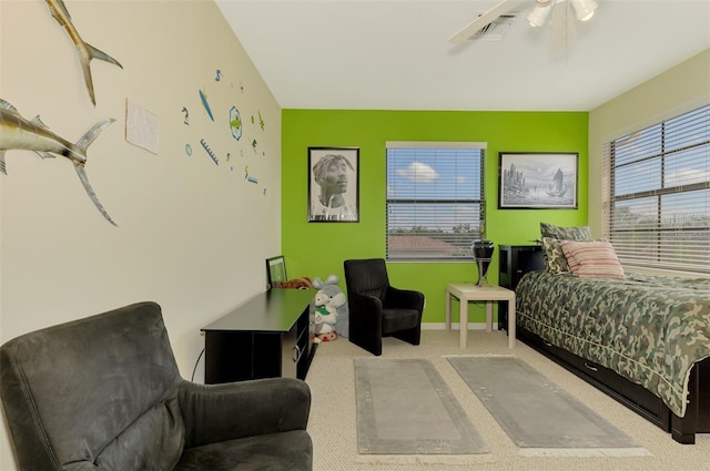 carpeted bedroom with ceiling fan