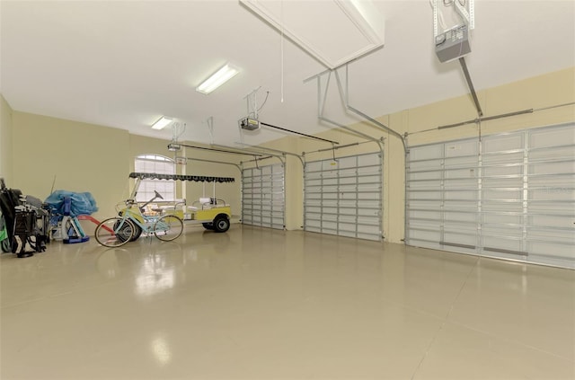 garage featuring a garage door opener