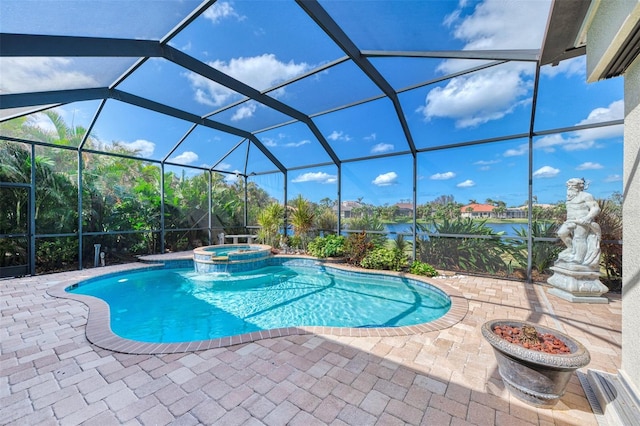 view of pool with a patio, glass enclosure, and an in ground hot tub