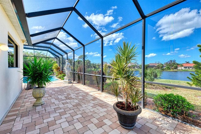 1509 Raphis Royale Blvd, Englewood, FL 34223 - view of patio / terrace featuring a lanai and a water view