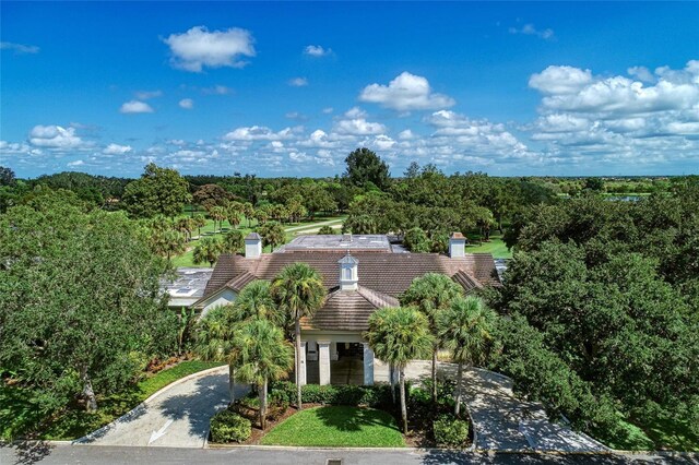 1509 Raphis Royale Blvd, Englewood, FL 34223 - view from above of property with a heavily wooded area