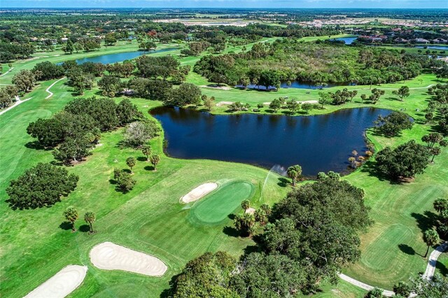1509 Raphis Royale Blvd, Englewood, FL 34223 - drone / aerial view of a nearby body of water, a tree filled landscape, and a golf course