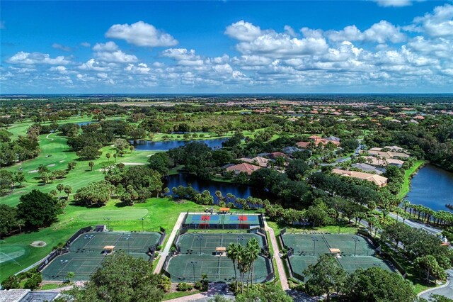 1509 Raphis Royale Blvd, Englewood, FL 34223 - aerial view of property's location featuring a large body of water, a golf course, a tree filled landscape, and nearby suburban area