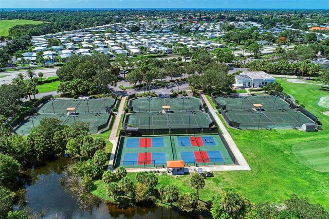 1509 Raphis Royale Blvd, Englewood, FL 34223 - aerial view of property's location featuring a large body of water, a local golf course, and nearby suburban area