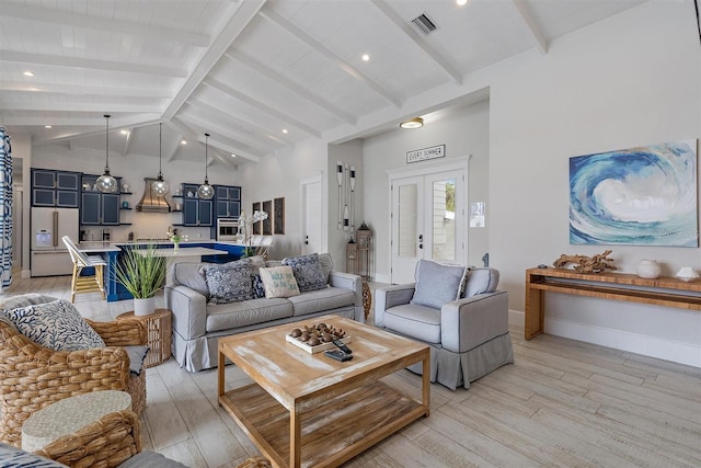 living room featuring high vaulted ceiling, french doors, beamed ceiling, and light hardwood / wood-style floors