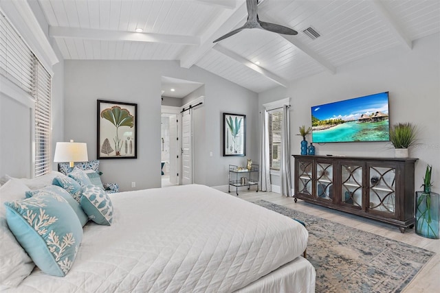 bedroom with wood ceiling, a barn door, ceiling fan, light hardwood / wood-style flooring, and lofted ceiling with beams