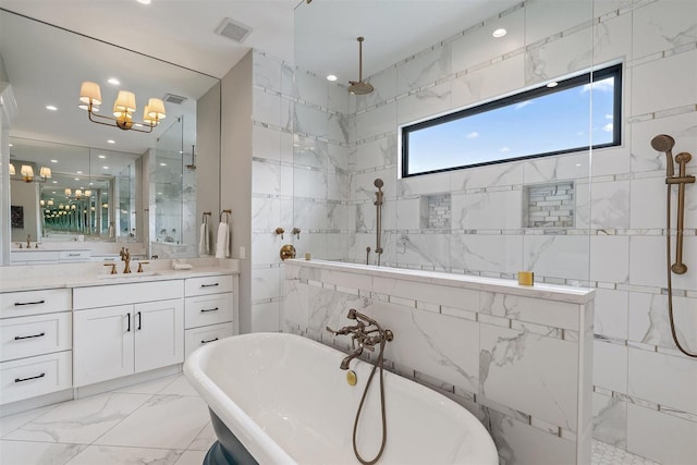 bathroom featuring vanity, tile walls, a notable chandelier, and plus walk in shower