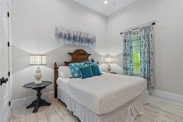 bedroom featuring hardwood / wood-style flooring