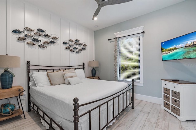 bedroom featuring light wood-type flooring and ceiling fan