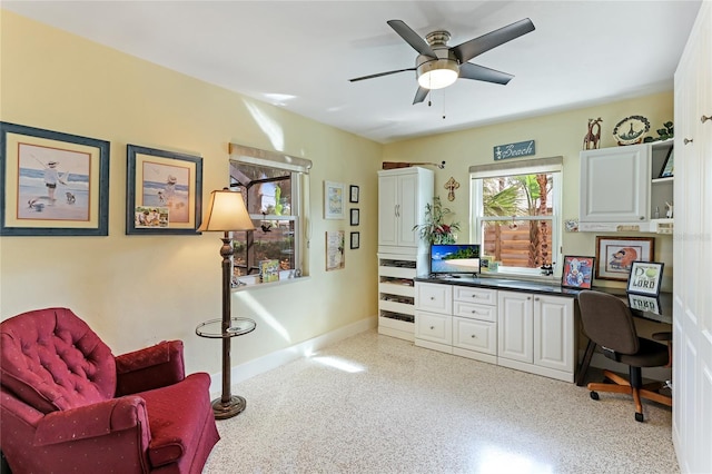 office area with ceiling fan