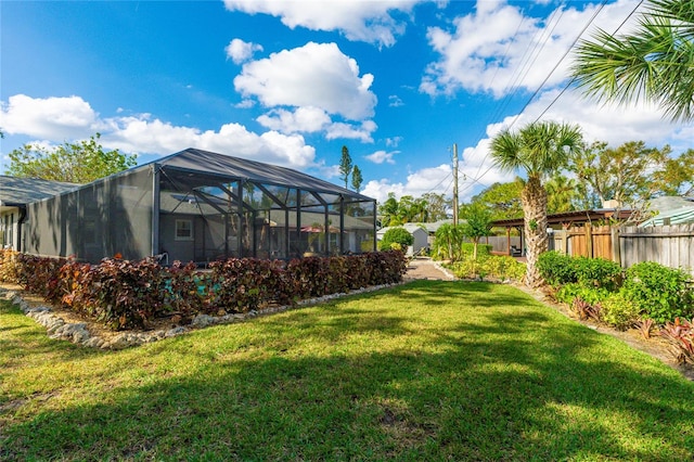 view of yard with a lanai