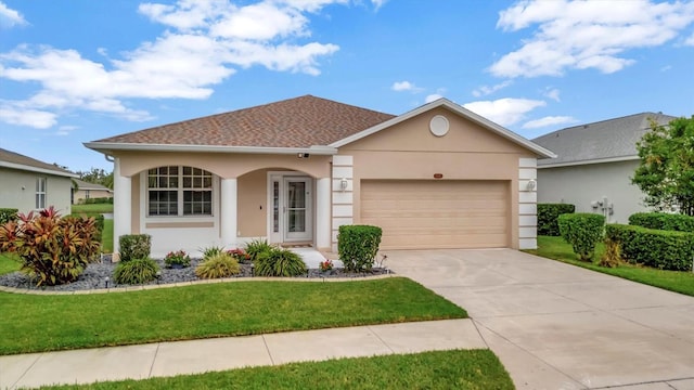 view of front facade featuring a garage and a front yard