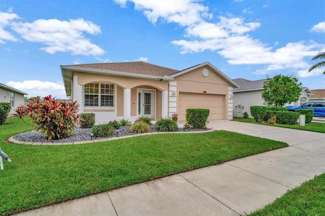 single story home with a garage and a front yard