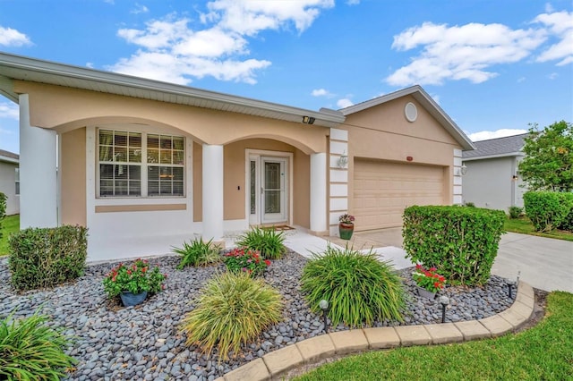 single story home with a garage