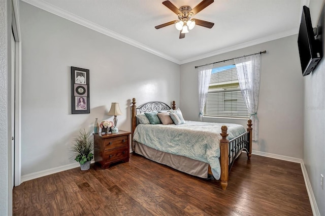 bedroom featuring ceiling fan, dark hardwood / wood-style floors, and crown molding