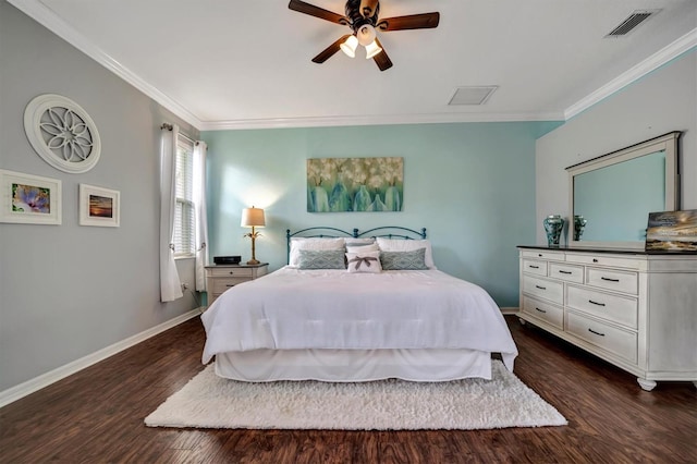 bedroom featuring dark wood-type flooring, ceiling fan, and crown molding