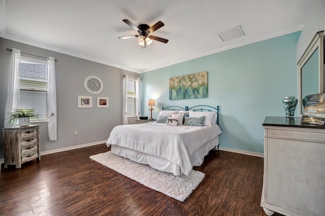 bedroom with ornamental molding, dark hardwood / wood-style flooring, and ceiling fan