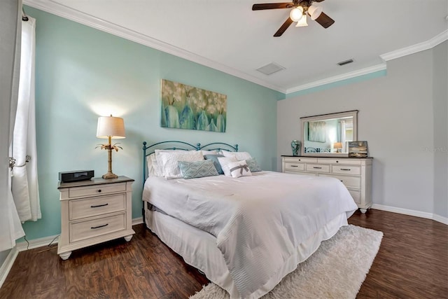 bedroom with ceiling fan, dark hardwood / wood-style flooring, and ornamental molding