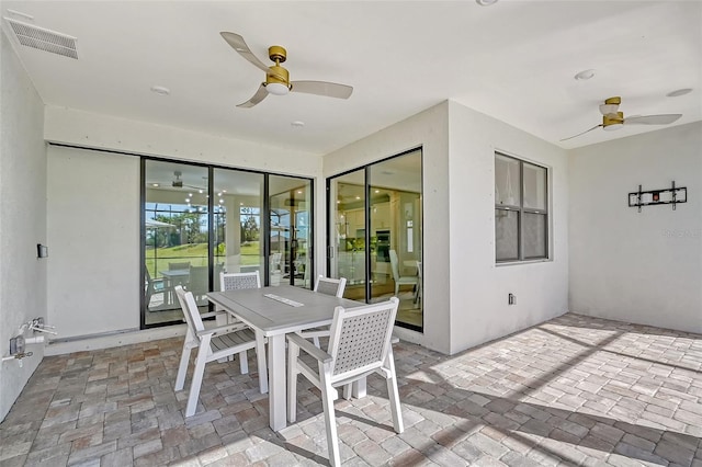 view of patio with ceiling fan