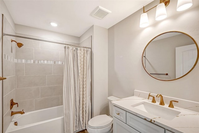 full bathroom with shower / bathtub combination with curtain, vanity, and toilet