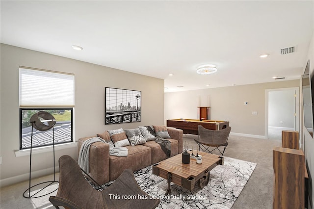 living room featuring light colored carpet and pool table